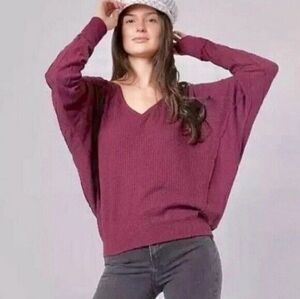 Free People Oversized V-Neck Sweater in Berry